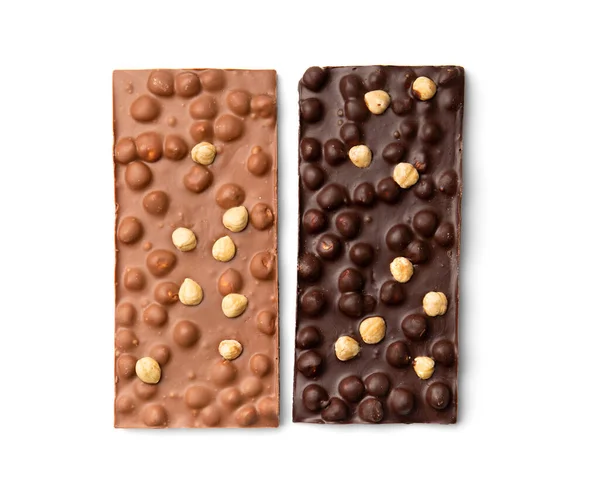 Dark and milk chocolate isolated. Handmade chocolate with nuts. Chocolate bars on a white background top view.