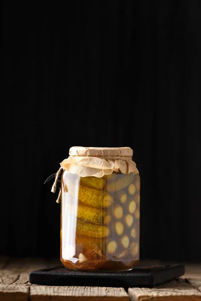 Pickled Cucumbers Closed Glass Jar Wooden Surface Place Text Pickled — Foto Stock