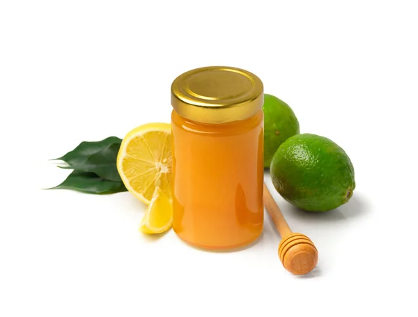 Honey Glass Jar Dipper Lime Lemon Leaves White Background Closed — Stok fotoğraf