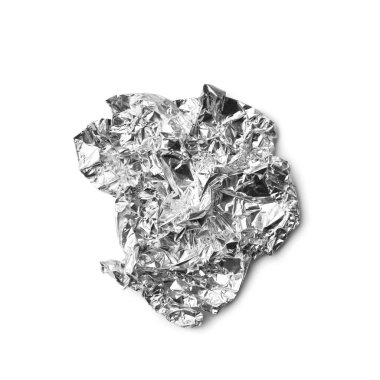 Crumpled aluminum foil from chocolate on isolation top view. Used crumpled shiny foil packaging from sweets or chocolate on insulation.
