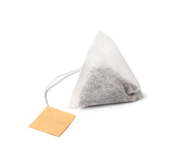 Pyramid shaped tea bag with label isolated on white background. clipart