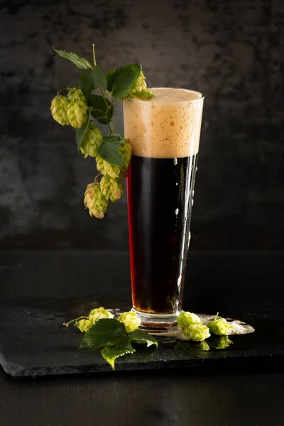 Dark Beer Mug Green Hop Wooden Table Brown Background Oktoberfest — Stockfoto