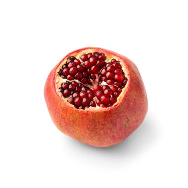 Ripe pomegranate fruit peeled on a white background close-up. Large open pomegranate fruit with large ripe grains isolated. Sliced exotic fruit.