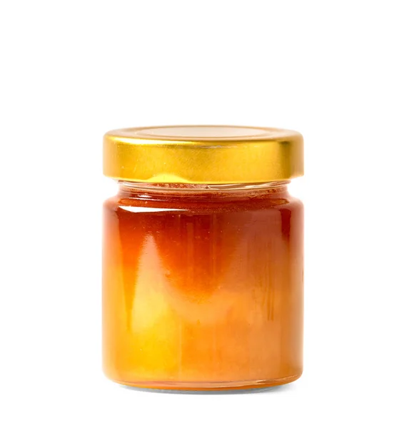 白い隔離された背景の閉じたガラス瓶の中の新鮮な蜂蜜クローズアップ 有機そばの蜂蜜 健康的な製品 — ストック写真