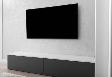 Modern bir oturma odasının bir parçası, gri bir duvarda akıllı bir LED TV, gri bir dolap, bir halı. İç mekanda minimalizm. Hafif tonlu oturma odaları.