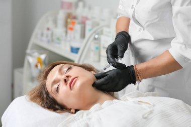 Face treatments. The concept of maintaining health, youth and beauty. Modern cosmetology, beautician tools. Beauty techniques. Facial mesotherapy. Beauty injections. Botulinum therapy of the face.