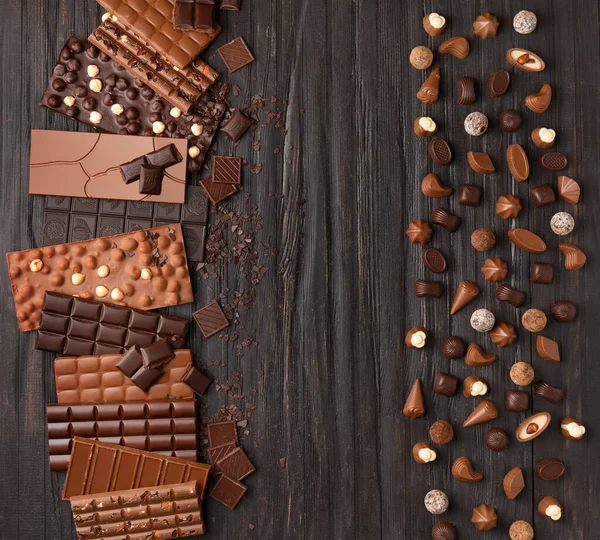 Különböző Étkezési Tejcsokoládé Cukorkák Pálcikák Csokoládé Csokoládé Szarvasgomba Egy Sötét — Stock Fotó