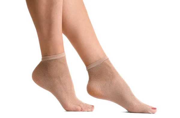 Жіночі Ноги Бежевих Коротких Сітчастих Шкарпетках Ізольовані Білому Тлі Шкарпетки — стокове фото