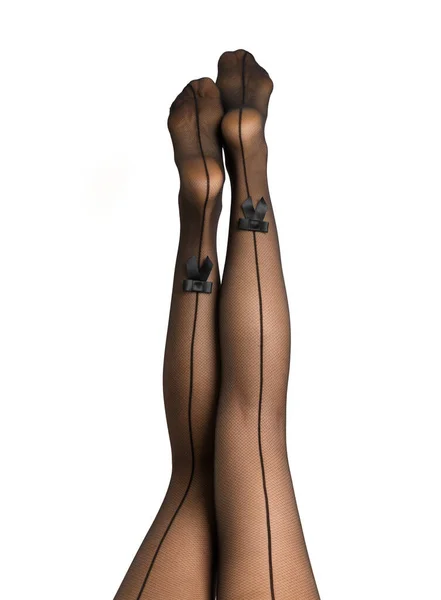 Slender Female Legs Black Tights Seam Satin Bow Raised White — Stock Photo, Image
