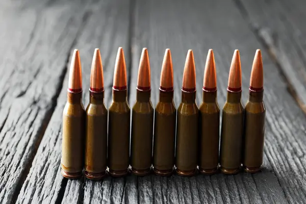 Ammunition Bullets Live Ammunition Firearms Black Wooden Background — Stock Photo, Image