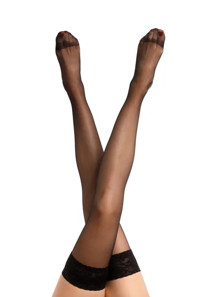 Slender Female Legs Black Stockings Raised White Background Close Girl — Stock Photo, Image