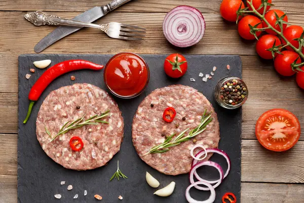 Raw Fresh Ground Beef Burger Patties Rosemary Vegetables Spices Black — Stock Photo, Image