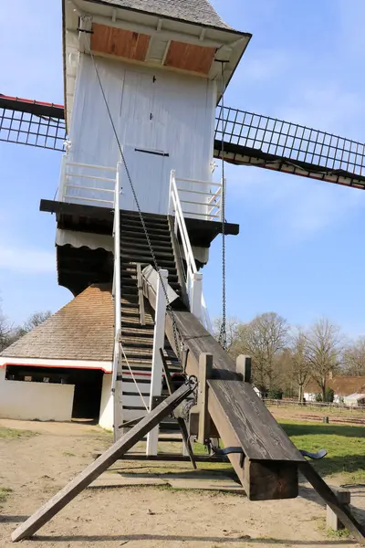 stock image back of an ancient windmill,  Genk, Belgium