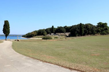 view in the lovely Verige bay in national park Brioni, Croatia clipart