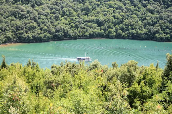 stock image boat on the Lim Fjord or Lim canal in Istria, Croatia