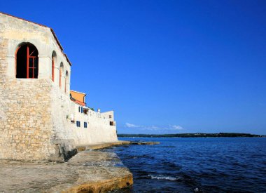 outer fortification walls of Novigrad, Cittanova, Croatia clipart