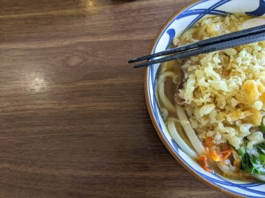 Close up of beef Udon with hot chili spicy and curry soup. The photo is suitable to use for Japan traditional food background, poster and food content media.