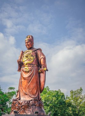 Chinese temple with guardian statue when Chinese new year celebration. The photo is suitable to use for Chinese new year, lunar new year background and content media.