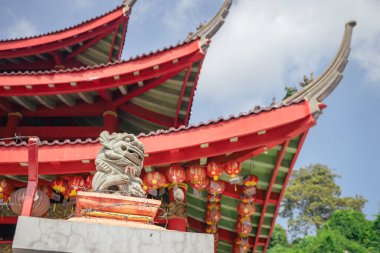 Traditional Chinese guardian gate statute on the Chinese temples when Chinese new years. The photo is suitable to use for Chinese new year, lunar new year background and content media.