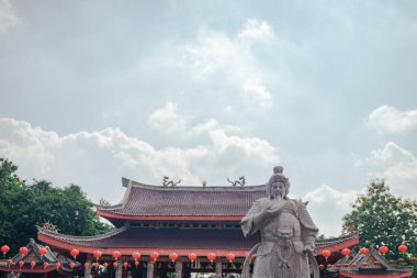 Traditional Chinese guardian gate statute on the Chinese temples when Chinese new years. The photo is suitable to use for Chinese new year, lunar new year background and content media.