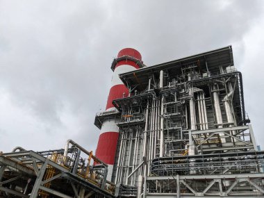 Power plant project with construction work and commissioning plant. The photo is suitable to use for industry background photography, power plant poster and electricity content media.