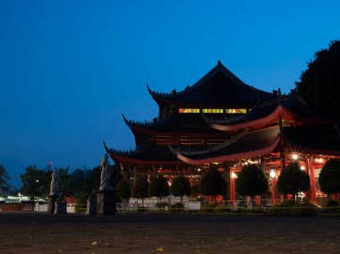 Chinese temple with guardian statue when Chinese new year celebration. The photo is suitable to use for Chinese new year, lunar new year background and content media.