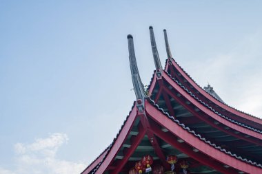 Chinese temple with guardian statue when Chinese new year celebration. The photo is suitable to use for Chinese new year, lunar new year background and content media.