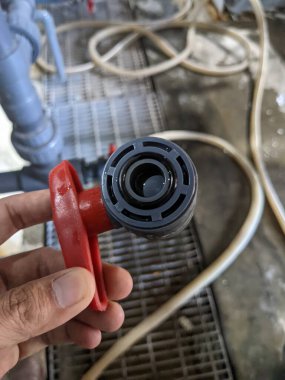 Power plant project activity for water treatment plant and checking equipment. The photo is suitable to use for industry background, construction poster and safety content media.