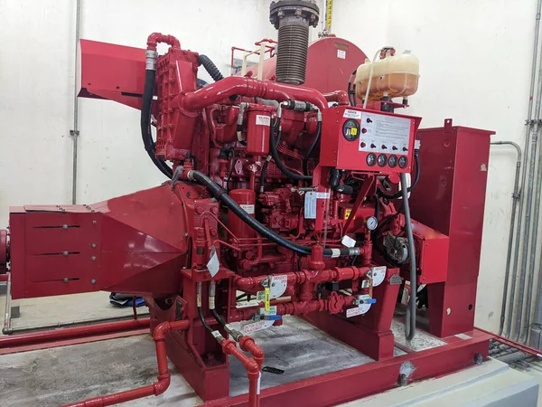 Emergency diesel and electric fire pump for power plant project. The photo is suitable to use for safety content media and fire protection background.