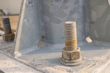 Elektrik santralinin temelinde cıvata somunu var. Fotoğraf mekanik arkaplan, endüstriyel içerik medyası ve mekanik eğitim için kullanılabilir.