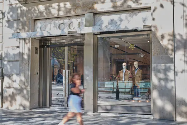 Stock image 24-08-2023. Barcelona, Spain, entrance to Gucci store in Barcelona with woman passing