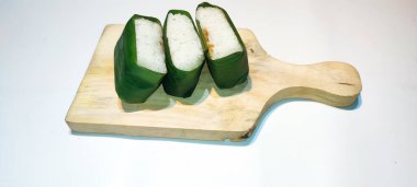 Indonesian Tradisional food called lemper contain rice cake with shredded chicken, fish or abon (meat floss) inside, isolated on white