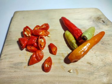 Red chili slices isolated on white, red chili seasoning pieces