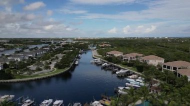 This 4K aerial drone footage offers a stunning view of a property located along the Florida intracoastal waterway. The footage captures the picturesque setting of the property, showcasing its location on the water.