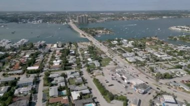 This 4K aerial drone footage offers a breathtaking view of a property situated on the Florida intracoastal waterway. The footage captures the picturesque setting of the property, showcasing the clear blue waters of the intracoastal.