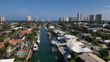 This 4K aerial drone footage offers a breathtaking view of a property situated on the Florida intracoastal waterway. The footage captures the picturesque setting of the property, showcasing the clear blue waters of the intracoastal.
