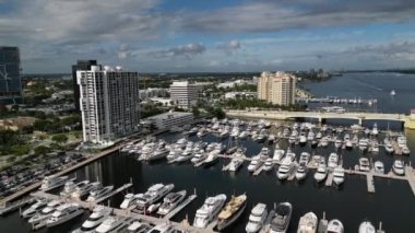 Explore the picturesque Intracoastal Waterway Marina in Florida from an aerial perspective with this 4K video. The footage provides a bird's-eye view of the area, showcasing the marina's layout, the boats moored and the surrounding natural beauty.