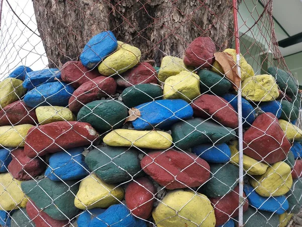 colorful rocks decorate the garden is very interesting to be enjoyed