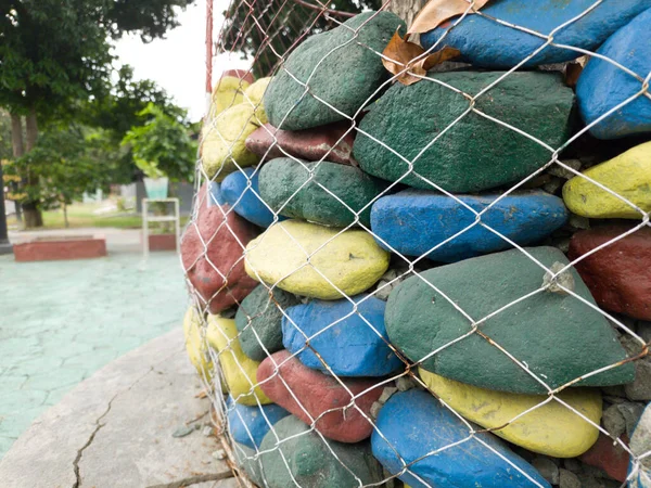 colorful rocks decorate the garden is very interesting to be enjoyed