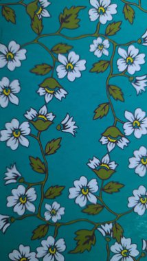 batik motifs of green flowers and birds of paradise