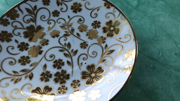 saucer for coffee or tea with a floral pattern