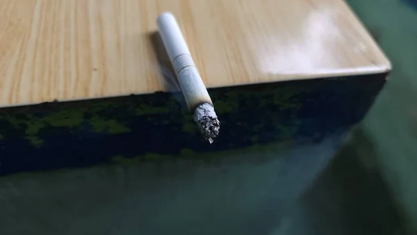 mild cigarettes that are burning