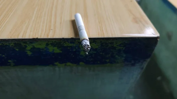 mild cigarettes that are burning