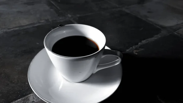 cups for coffee and tea made of plain white ceramic