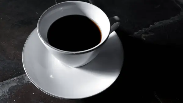 cups for coffee and tea made of plain white ceramic