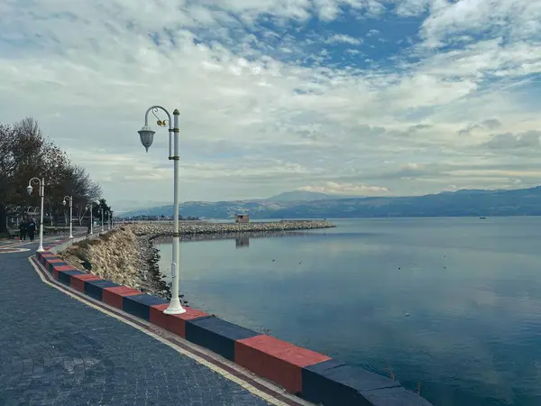 street lamp on the walkway by the lake