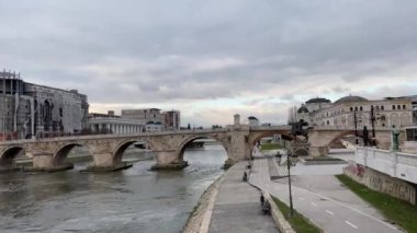 walking on an old stone bridge