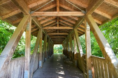 Fulda Bridge in the Fulda Valley. Pedestrian and cyclist bridge made of a wooden structure.