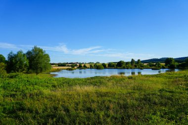 Glockenborn nature reserve in the Brndersen district near Wolfhagen. Landscape with wet meadows and small ponds.