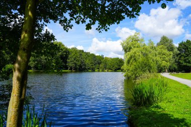 Paddelteich in Bad Wnneberg. Idyllic landscape at the lake with green nature.